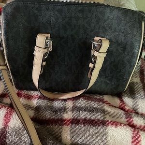 Michael Kors Pocketbook. 12 inches wide and 10 inches long.